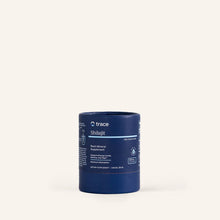 Load image into Gallery viewer, Blue cylindrical container labeled 'trace Shilajit' on a white background
